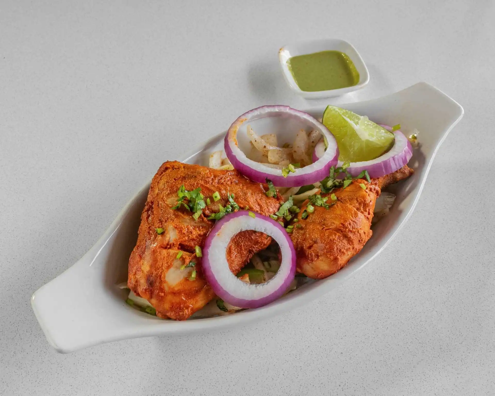 Tandoori Chicken grilled in clay oven at Chef's Indian Kitchen Medicine Hat